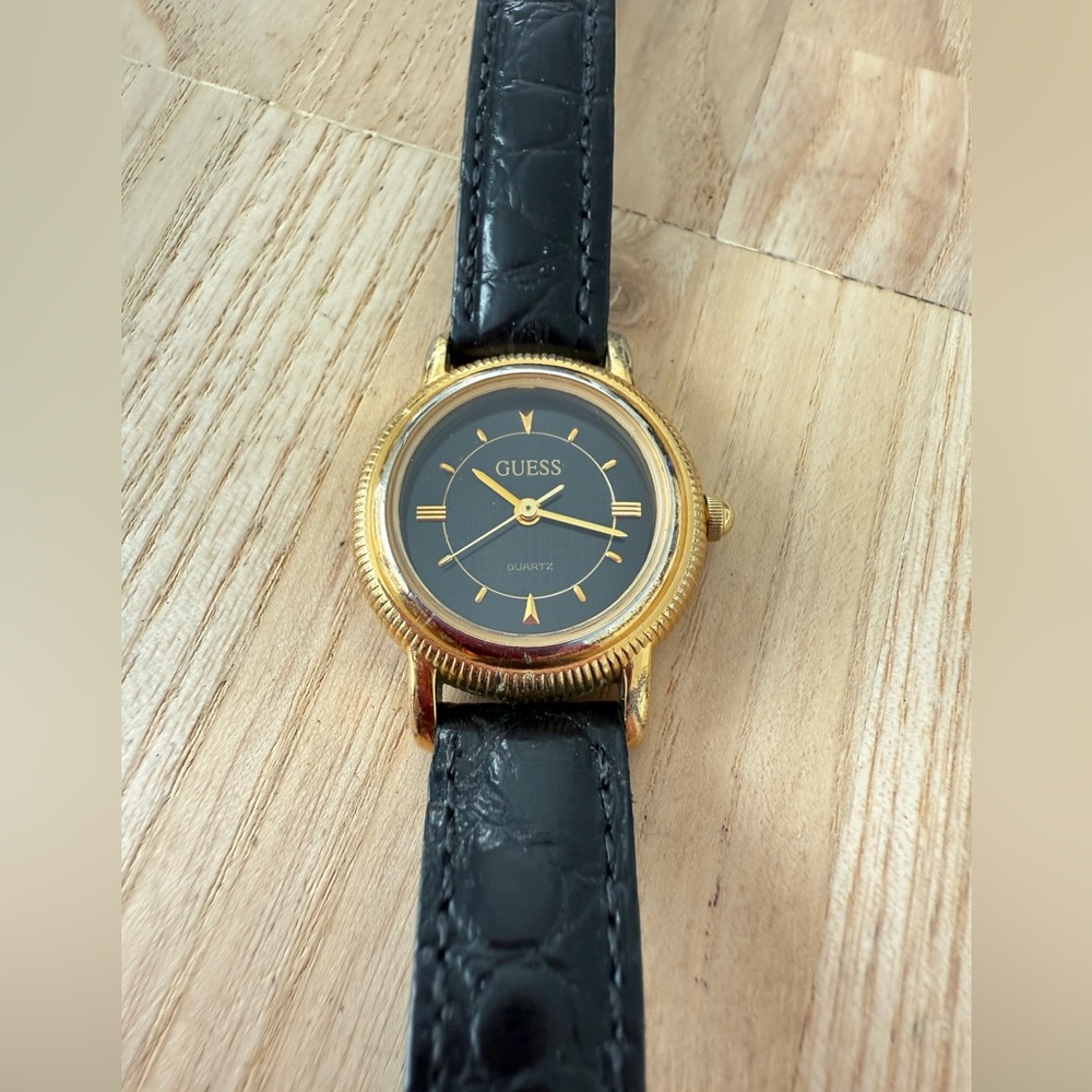 Vintage guess ladies gold tone black leather watch NEW BATTERY
